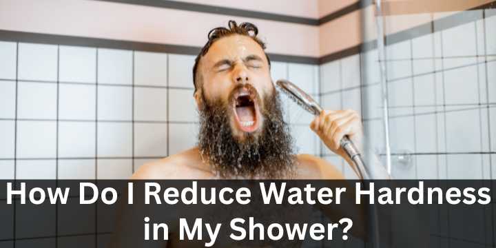 A man showering using a handheld shower head