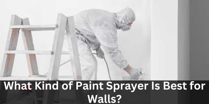A man paint spraying a wall